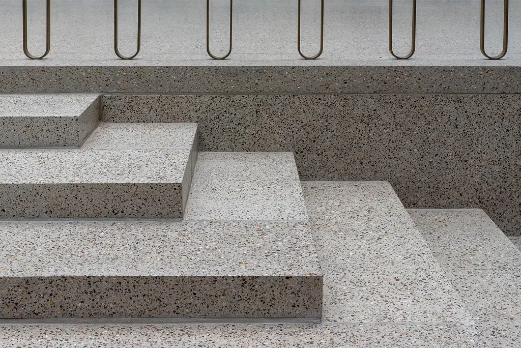 Polished terrazzo steps and landing showing the aggregate in the surface